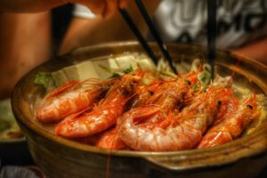 cooked shrimps on brown ceramic bowl